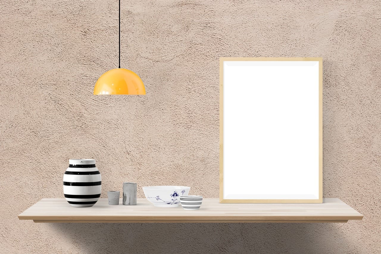 The cupboard office: a desk, two shelves, a lamp and doors that close at six.