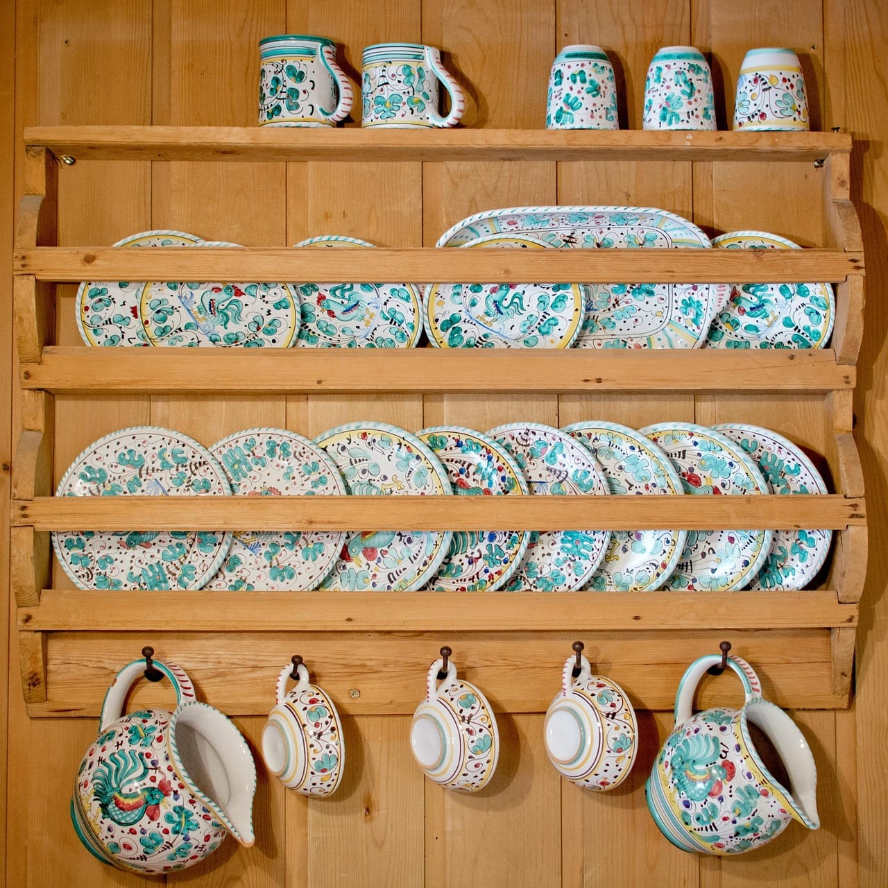 Everyday plates on an open shelf: they get used, so they never get dusty.
