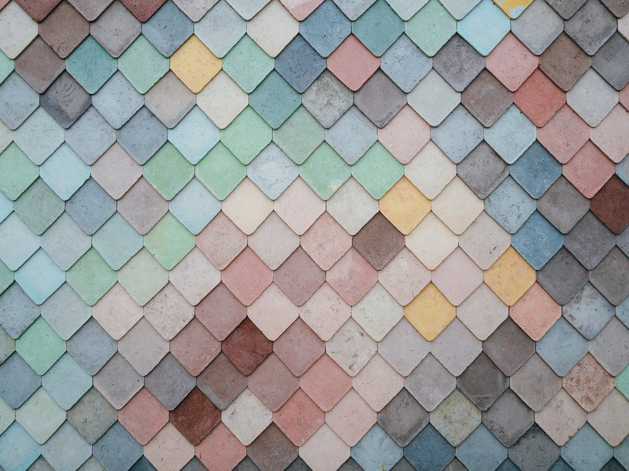 The painted tiles around the bath, eighteen months on.
